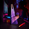 Peak Pro 3DXL Plasma standing on a table under purple ambient lighting