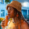 Veazy vaporizer storz and bickel inspiring orange woman holding