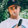 gpen dash plus vaporizer black held by man