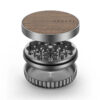 Vessel Mill Grinder in Walnut apart to show the sharp grinding teeth and large herb chamber EU