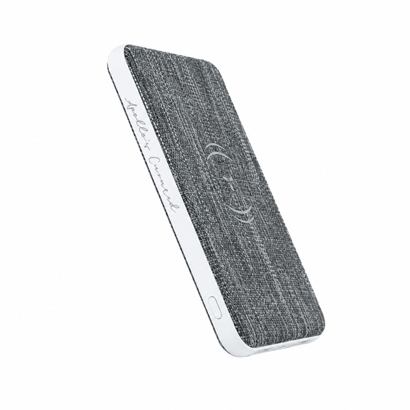 Grey AirVape power bank with fabric surface and wireless charging area