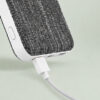 Close-up of the Micro-USB cable connected to the AirVape power bank