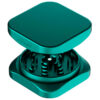 Open Emerald Green Krush Kube 2.0 XL Grinder showing the grinding teeth