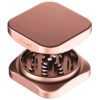 Open Rose Gold Krush Kube 2.0 XL Grinder showing the grinding teeth