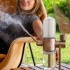Desert Rose Stündenglass Gravity Infuser being used on an outdoor table