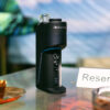 Dr. Dabber Switch GO standing upright on a table in a lifestyle setting