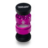 Open pink Santa Cruz Shredder Split Series grinder showing teeth, screen and collection chamber