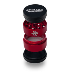 Open red Santa Cruz Shredder Split Series grinder displaying its 4 piece internal design
