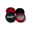 Red Split Series grinder taken apart to show the grinding, screening and collection sections